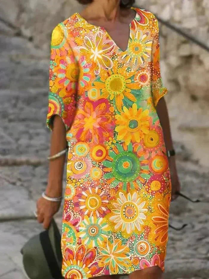 Nira | Robe midi à fleurs éclatantes