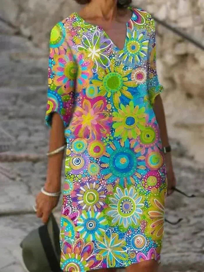 Nira | Robe midi à fleurs éclatantes